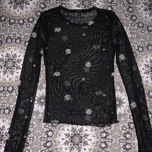 Sheer top with daisies